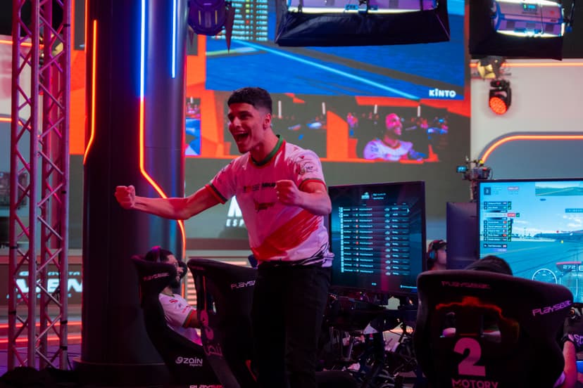 Photo of participant cheering with fists closed