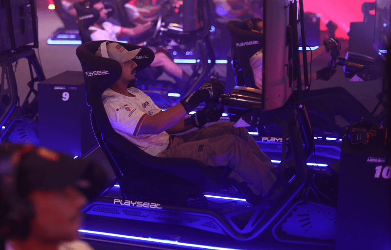 Photo of participant racing in the sim rig